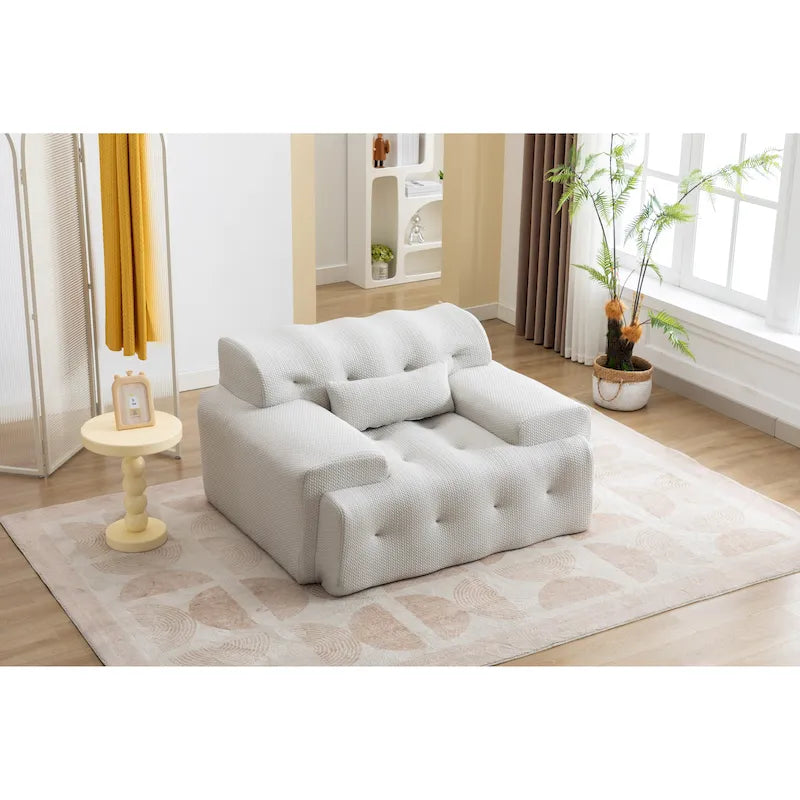 Fauteuil une place beige capitonné avec coussin en mousse haute densité