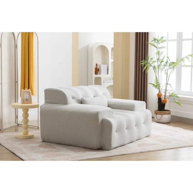 Fauteuil une place beige capitonné avec coussin en mousse haute densité