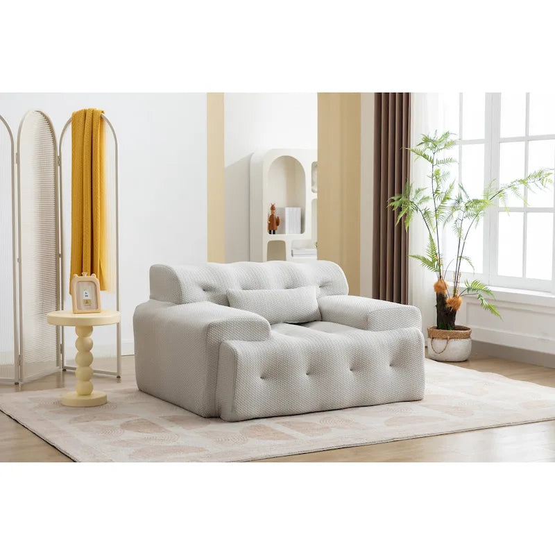 Fauteuil une place beige capitonné avec coussin en mousse haute densité