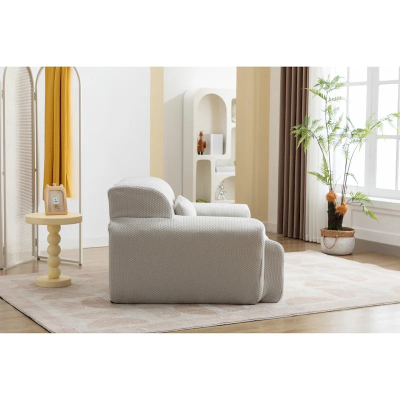 Fauteuil une place beige capitonné avec coussin en mousse haute densité