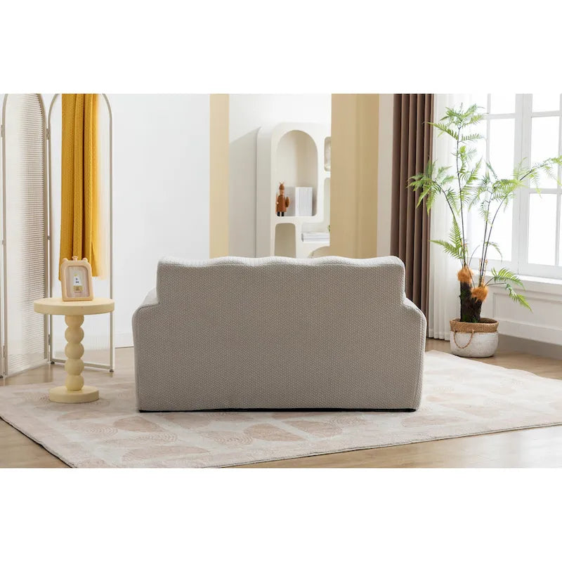 Fauteuil une place beige capitonné avec coussin en mousse haute densité