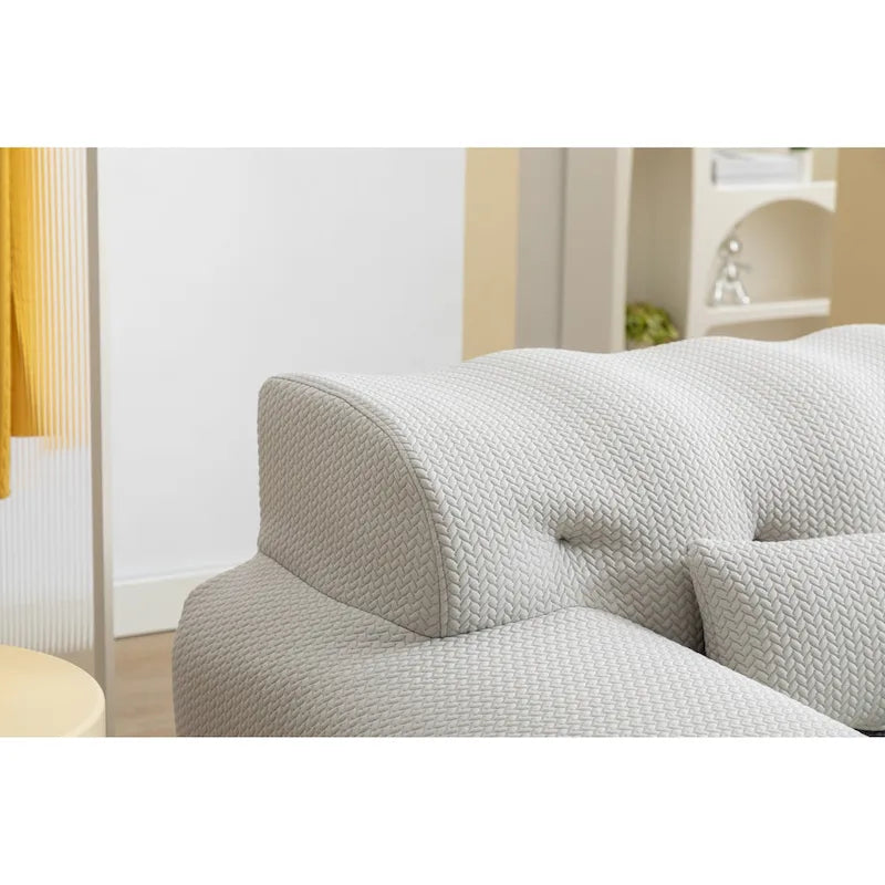 Fauteuil une place beige capitonné avec coussin en mousse haute densité