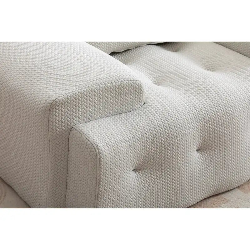 Fauteuil une place beige capitonné avec coussin en mousse haute densité