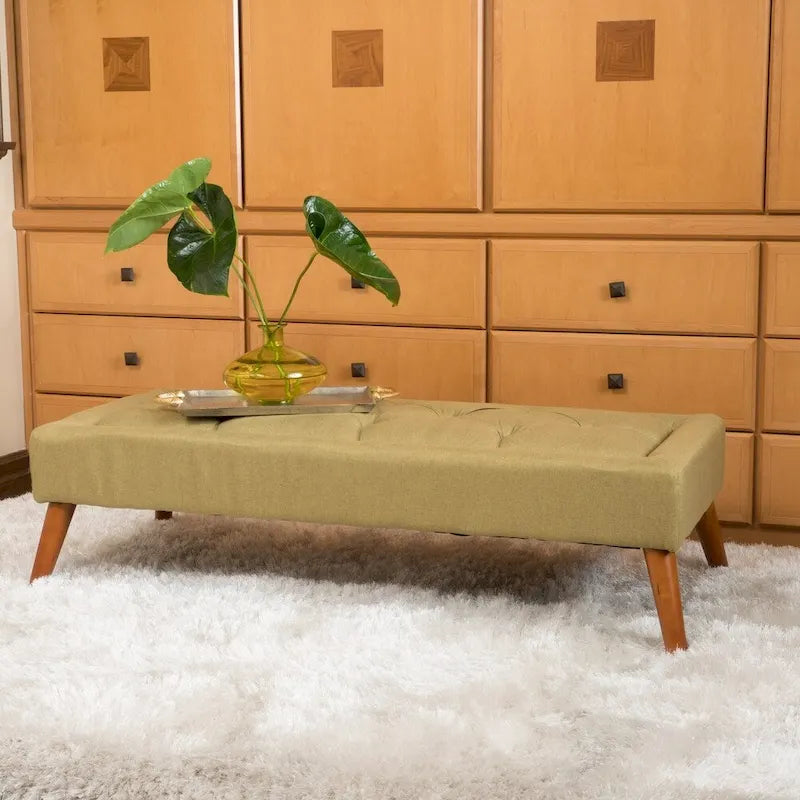 Banc ottoman en tissu capitonné avec pieds fuselés en bois multicolore