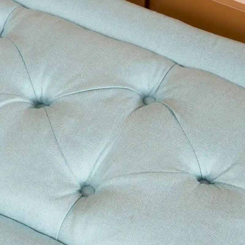 Banc ottoman en tissu capitonné avec pieds fuselés en bois multicolore