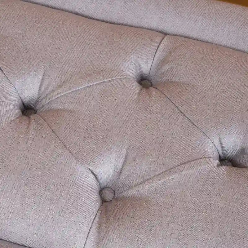 Banc ottoman en tissu capitonné avec pieds fuselés en bois multicolore