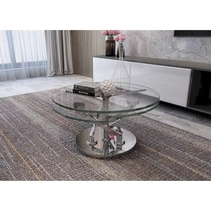 Table basse ronde pivotante en verre avec base en argent poli