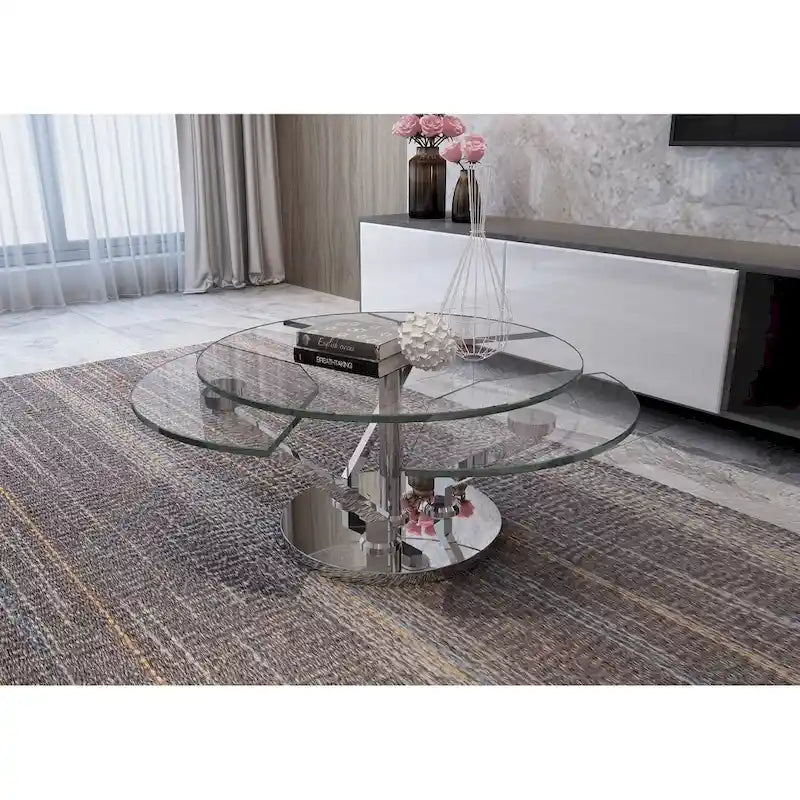 Table basse ronde pivotante en verre avec base en argent poli