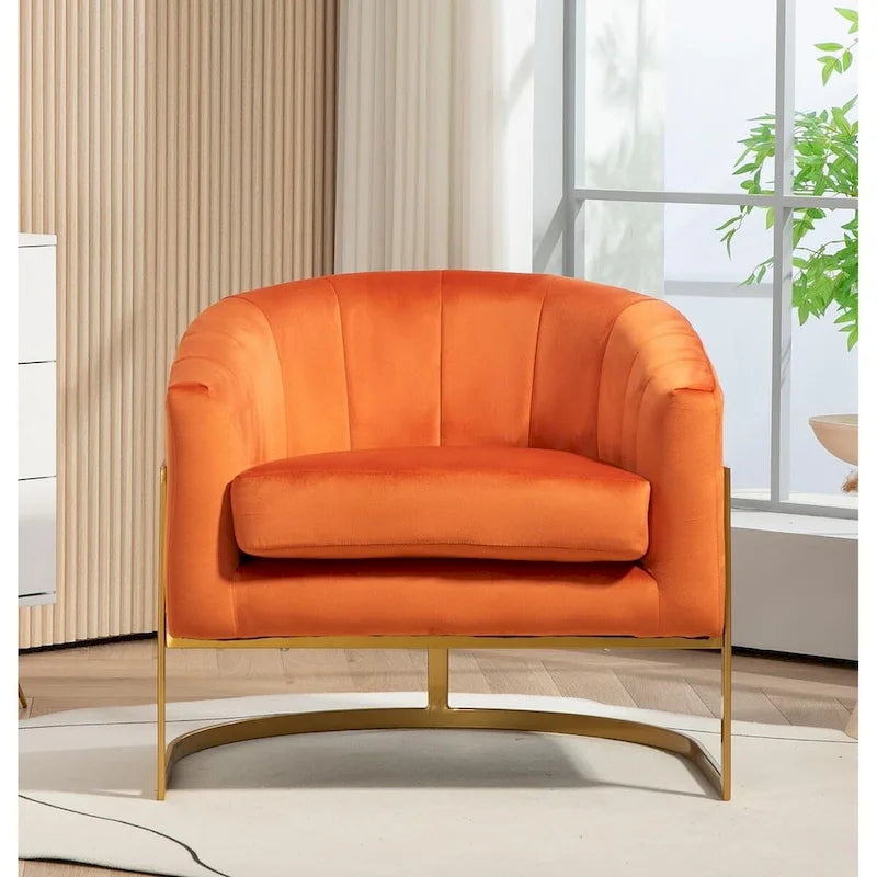 Fauteuil crapaud en velours avec piètement en métal doré