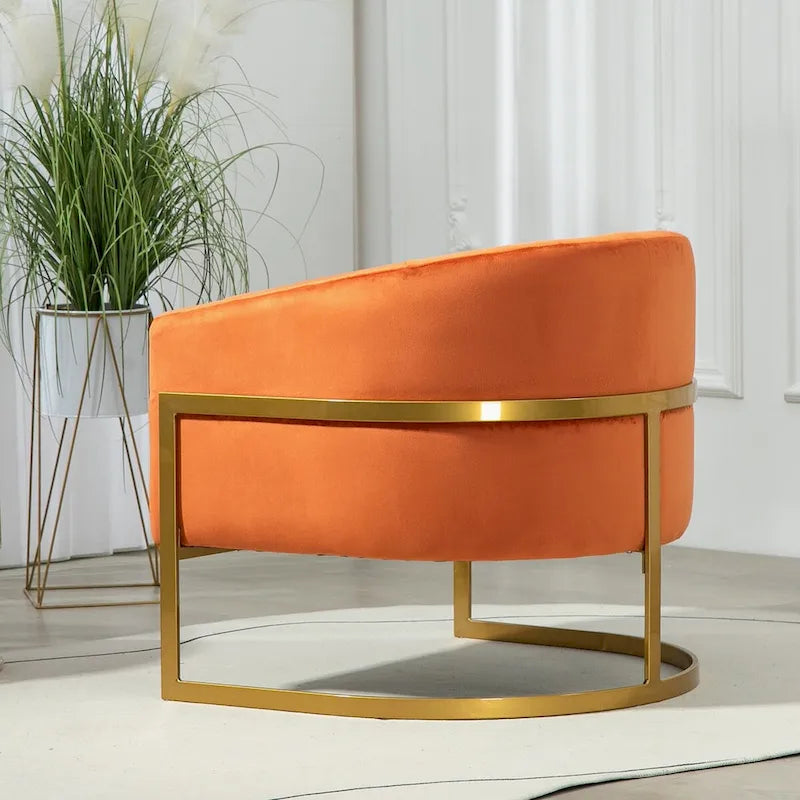 Fauteuil crapaud en velours avec piètement en métal doré