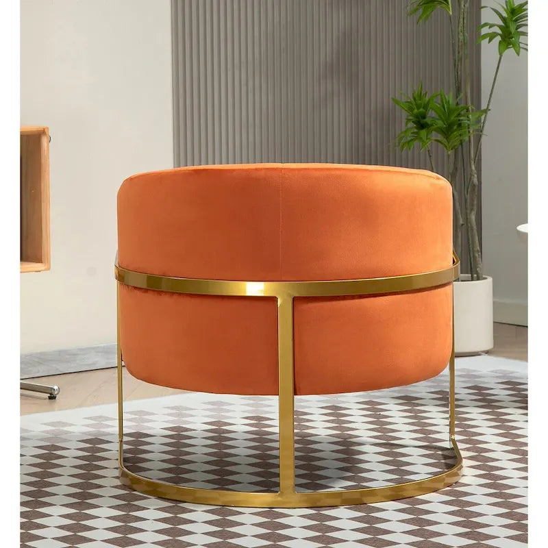 Fauteuil crapaud en velours avec piètement en métal doré