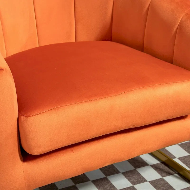 Fauteuil crapaud en velours avec piètement en métal doré