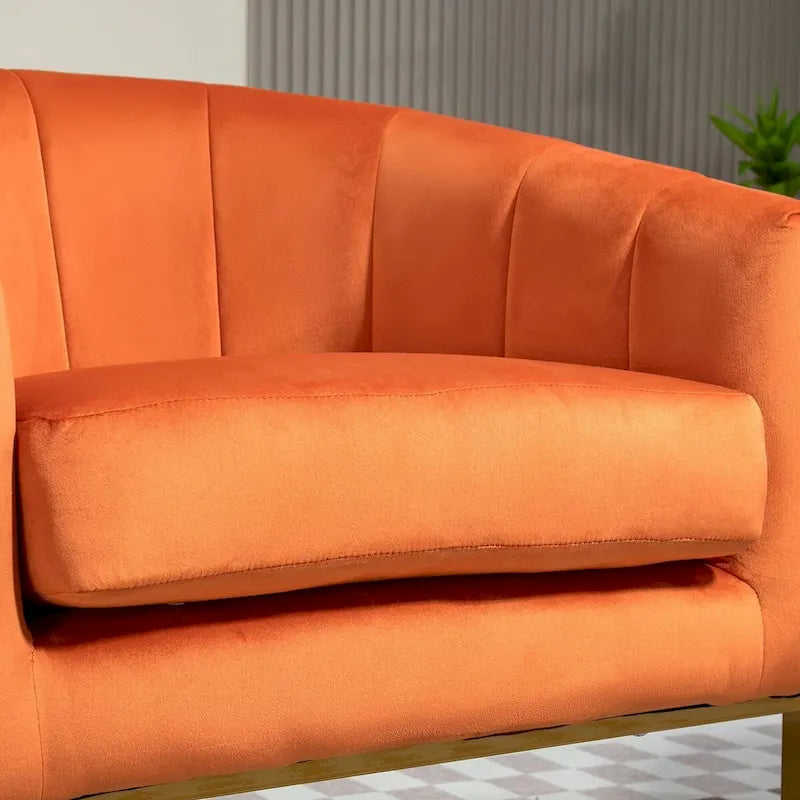 Fauteuil crapaud en velours avec piètement en métal doré