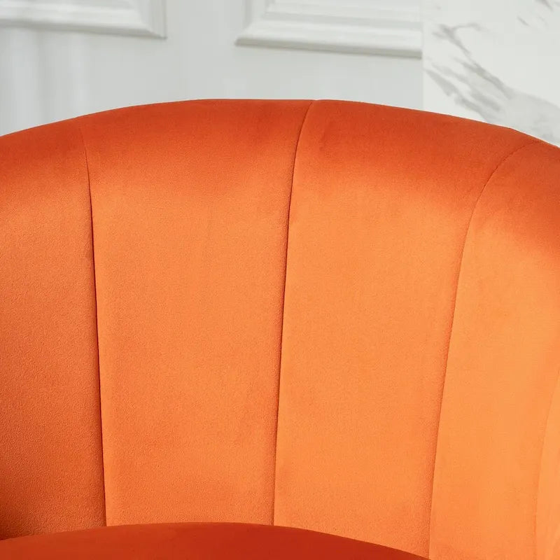 Fauteuil crapaud en velours avec piètement en métal doré