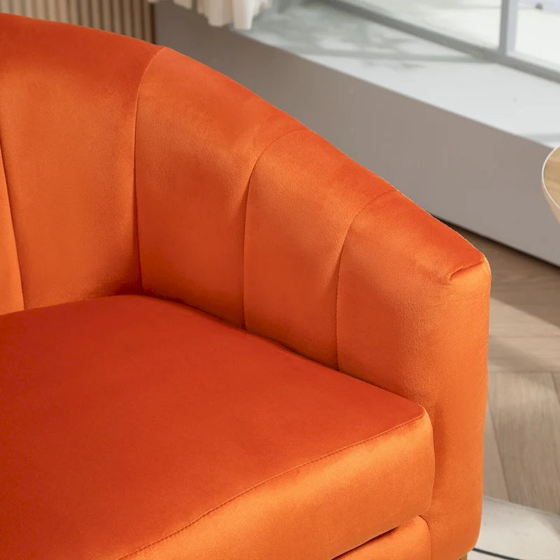 Fauteuil crapaud en velours avec piètement en métal doré