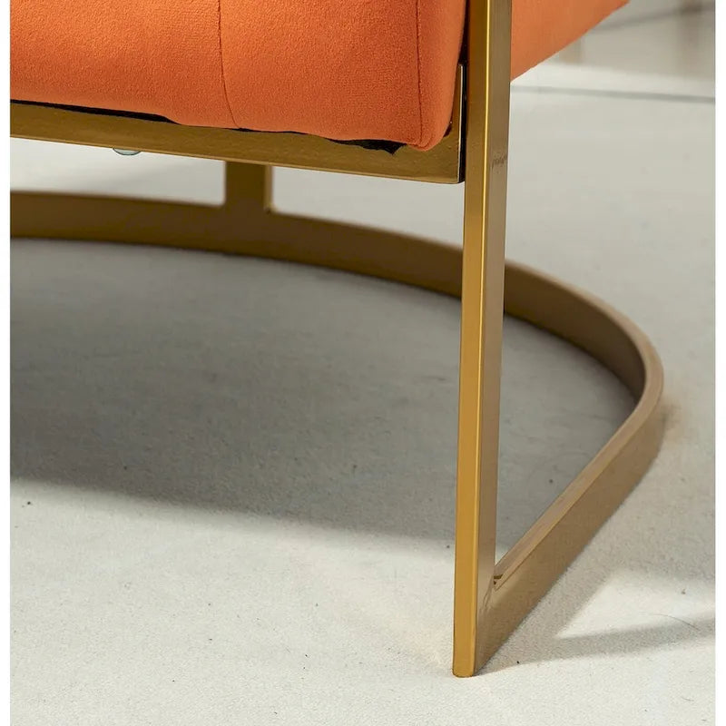 Fauteuil crapaud en velours avec piètement en métal doré
