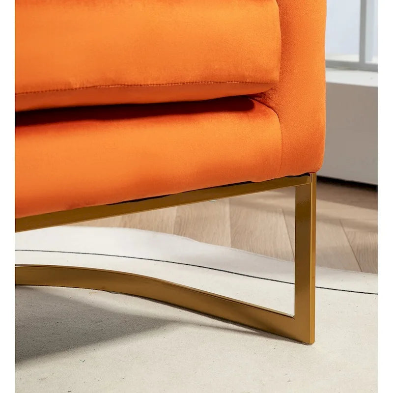 Fauteuil crapaud en velours avec piètement en métal doré