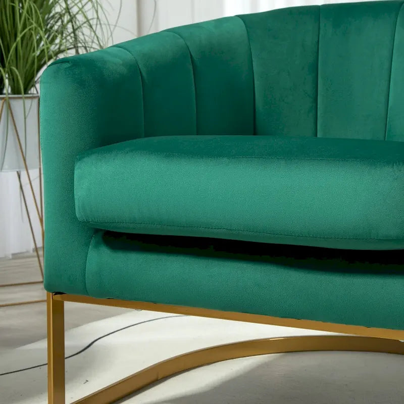 Fauteuil crapaud en velours avec piètement en métal doré